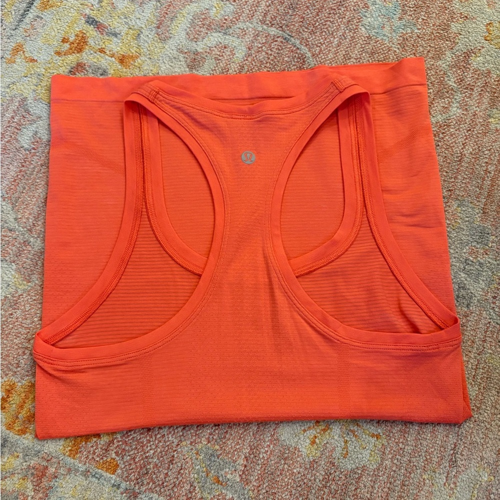 SOLD‼️
lululemon athletica Orange Tank Top